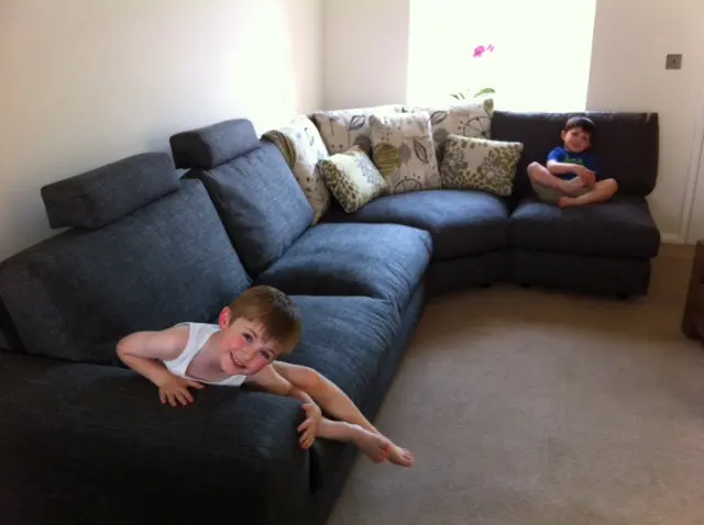 Ben &Henry making the most of our new Fama sofa