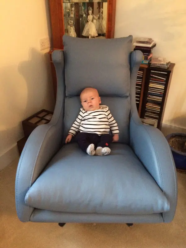 Great grandchild Clark enjoying my new chair