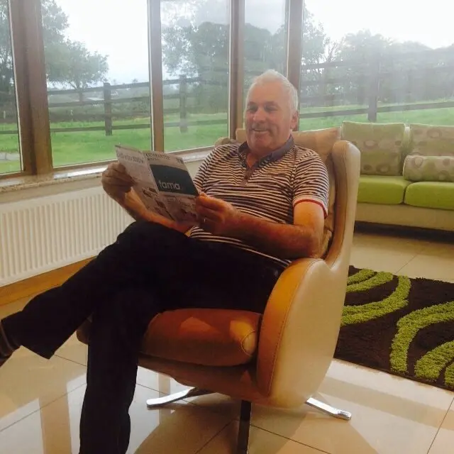 Dad Rested and Relaxed reading up on Fama