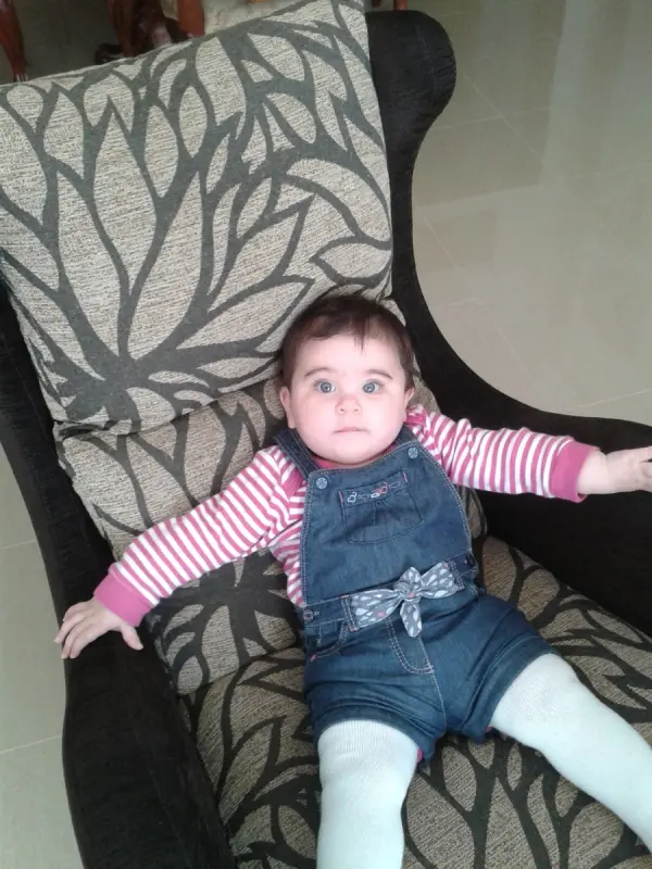eli chilling on our new fama armchair