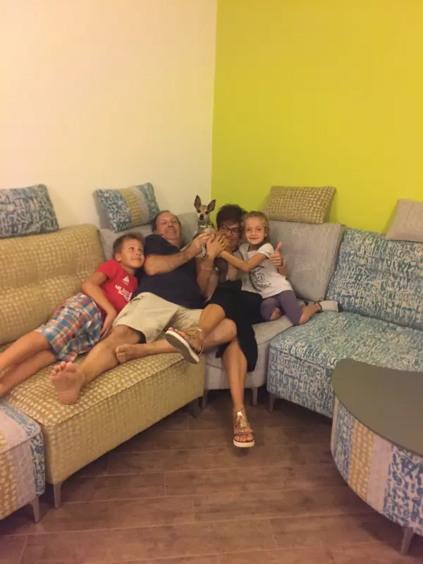 Happy family on a beautiful sofa