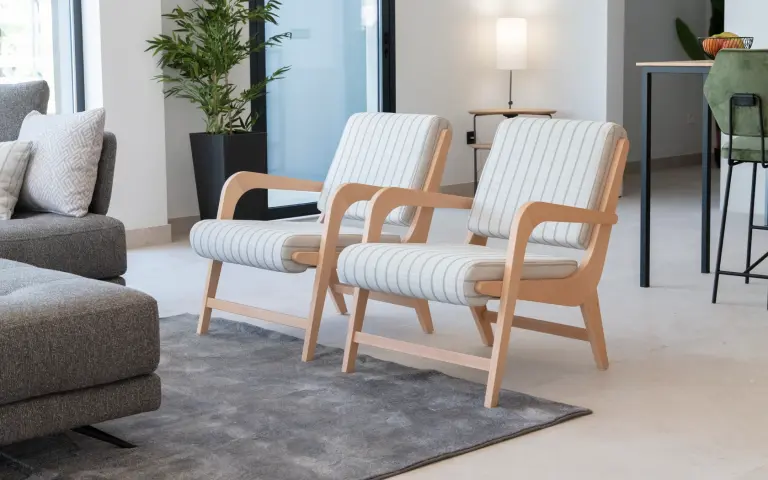 Boomerang armchairs by Fama Sofas