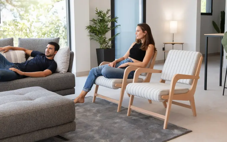 Boomerang armchairs by Fama Sofas